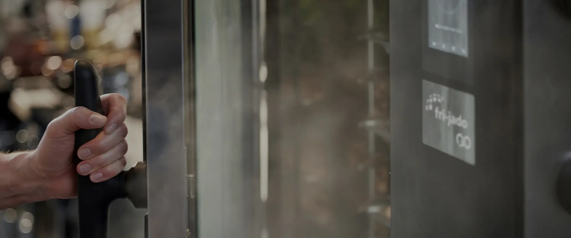 Fri-Jado GO combi oven opening with steam coming out