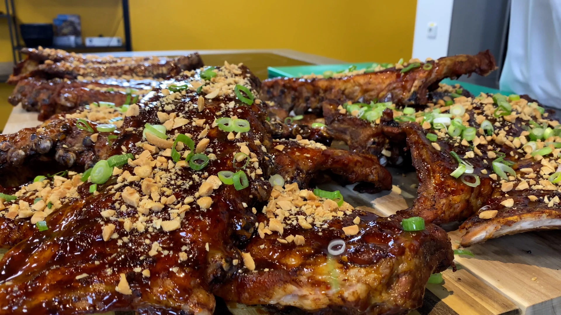 rotisserie spareribs with an sweet chilli taste topped with peanuts and spring onions