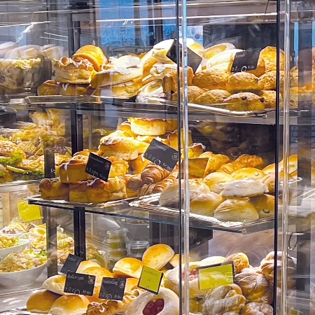 close up of delicious pastries in frijado food display