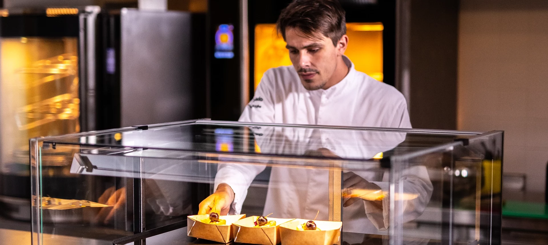fri-jado chef placing food in food display